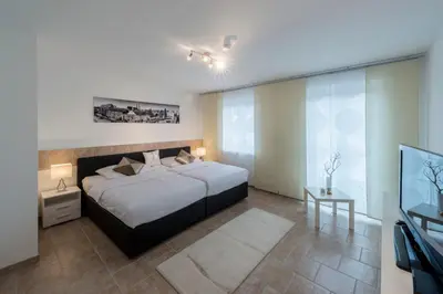Ein Bett oder Betten in einem Zimmer der Unterkunft WN Rooms