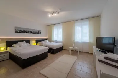 Ein Bett oder Betten in einem Zimmer der Unterkunft WN Rooms