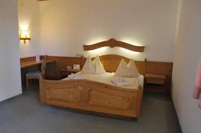 Ein Bett oder Betten in einem Zimmer der Unterkunft Hotel Restaurant Schwartz