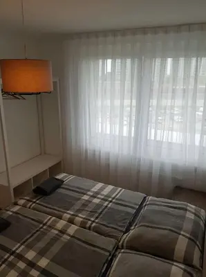 Ein Bett oder Betten in einem Zimmer der Unterkunft Vienna Hauptbahnhof Apartments 5