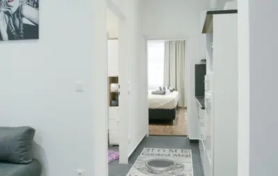 Ein Bett oder Betten in einem Zimmer der Unterkunft Lotus Apartment Vienna