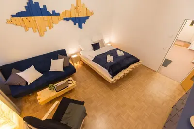 Ein Bett oder Betten in einem Zimmer der Unterkunft Stunning Apartment Vienna Central Station