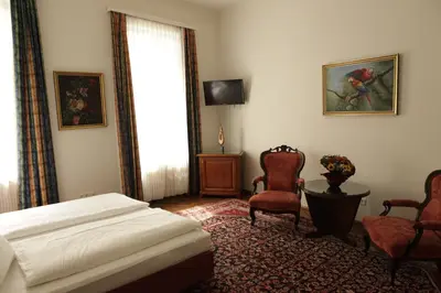 Ein Bett oder Betten in einem Zimmer der Unterkunft Hotel Domizil