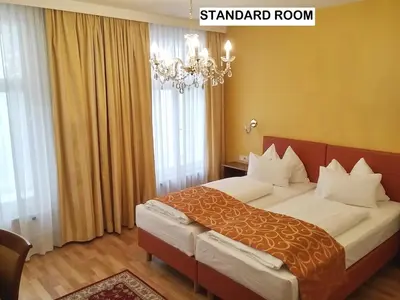 Ein Bett oder Betten in einem Zimmer der Unterkunft Hotel Domizil