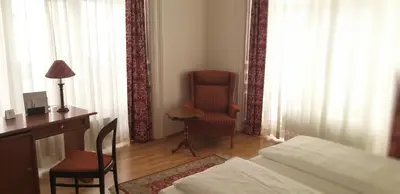 Ein Bett oder Betten in einem Zimmer der Unterkunft Hotel Domizil