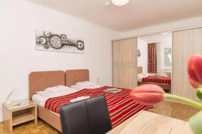 Ein Bett oder Betten in einem Zimmer der Unterkunft Appartements Ferchergasse