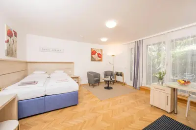 Ein Bett oder Betten in einem Zimmer der Unterkunft Appartements Ferchergasse