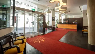 Ein Sitzbereich in der Unterkunft Hotel Post Wien