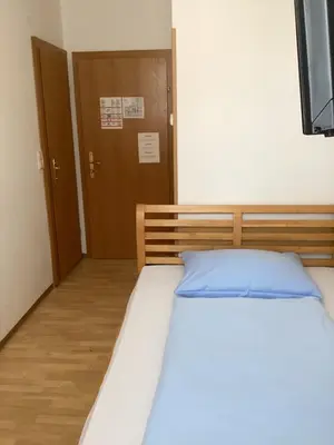 Ein Bett oder Betten in einem Zimmer der Unterkunft Hotel Pribitzer