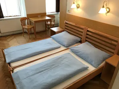 Ein Bett oder Betten in einem Zimmer der Unterkunft Hotel Pribitzer