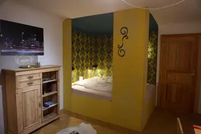 Ein Bett oder Betten in einem Zimmer der Unterkunft VOLKSinn