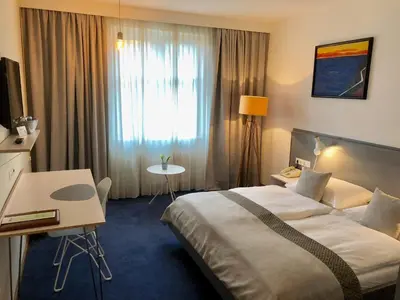 Ein Bett oder Betten in einem Zimmer der Unterkunft Hotel Restaurant Höldrichsmühle