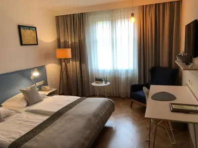 Ein Bett oder Betten in einem Zimmer der Unterkunft Hotel Restaurant Höldrichsmühle