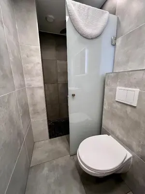 Ein Badezimmer in der Unterkunft Apartments Wile Süd