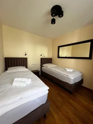 Ein Bett oder Betten in einem Zimmer der Unterkunft Apartments Wile Süd