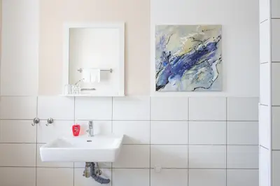 Ein Badezimmer in der Unterkunft Pension Laubenhof