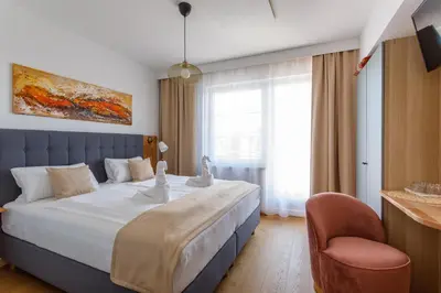 Ein Bett oder Betten in einem Zimmer der Unterkunft Pension Laubenhof