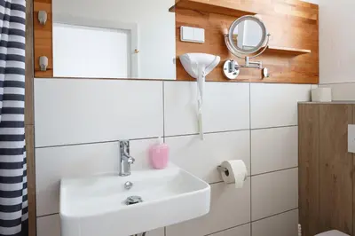 Ein Badezimmer in der Unterkunft Pension Laubenhof