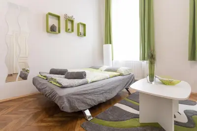 Ein Sitzbereich in der Unterkunft Belvedere Palace Green Heart Studio