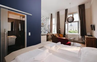 Ein Bett oder Betten in einem Zimmer der Unterkunft KH Apartments Universitaet