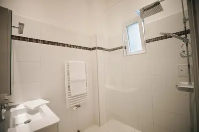 Ein Badezimmer in der Unterkunft KH Apartments Universitaet