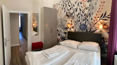 Ein Bett oder Betten in einem Zimmer der Unterkunft KH Apartments Universitaet