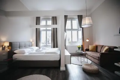 Ein Bett oder Betten in einem Zimmer der Unterkunft KH Apartments Universitaet