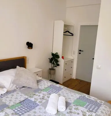 Ein Bett oder Betten in einem Zimmer der Unterkunft Boutiquehotel Landhaus am Kurpark