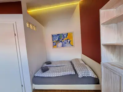 Ein Bett oder Betten in einem Zimmer der Unterkunft Alina's