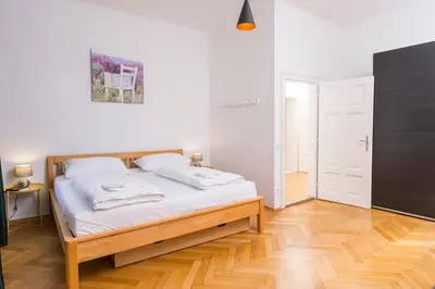 Ein Bett oder Betten in einem Zimmer der Unterkunft Belvedere Suite