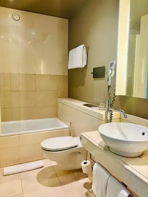 Ein Badezimmer in der Unterkunft Max Brown Hotel 5th District, part of Sircle Collection