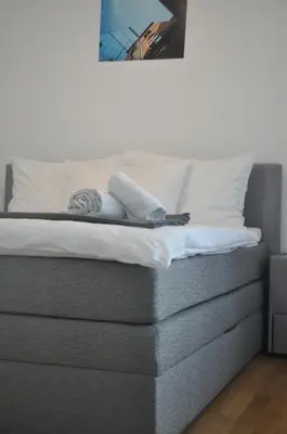 Ein Bett oder Betten in einem Zimmer der Unterkunft 4 Beds and More Vienna Apartments - Contactless check-in