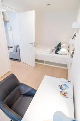 Ein Bett oder Betten in einem Zimmer der Unterkunft Luxury Suites Liechtenstein