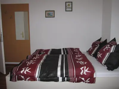 Ein Bett oder Betten in einem Zimmer der Unterkunft Pension Casa Topolino