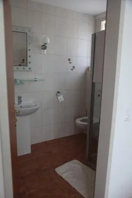 Ein Badezimmer in der Unterkunft Pension Casa Topolino