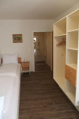 Ein Bett oder Betten in einem Zimmer der Unterkunft Pension Casa Topolino