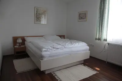 Ein Bett oder Betten in einem Zimmer der Unterkunft Pension Casa Topolino