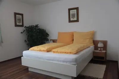 Ein Bett oder Betten in einem Zimmer der Unterkunft Pension Casa Topolino