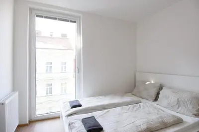 Ein Bett oder Betten in einem Zimmer der Unterkunft Vienna City Apartments 1100 Vienna