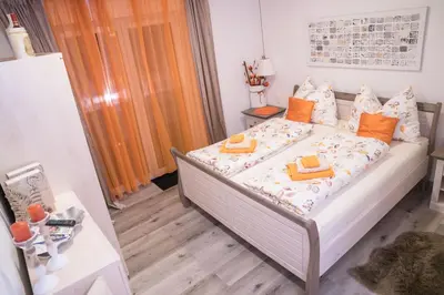 Ein Bett oder Betten in einem Zimmer der Unterkunft Pension & Restaurant La Amalia