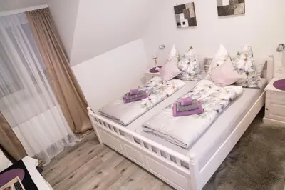 Ein Bett oder Betten in einem Zimmer der Unterkunft Pension & Restaurant La Amalia