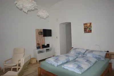 Ein Bett oder Betten in einem Zimmer der Unterkunft Wiener Ferienwohnung