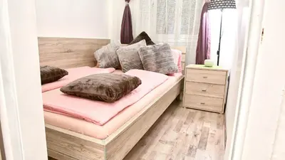 Ein Bett oder Betten in einem Zimmer der Unterkunft SpongeBob Apartment