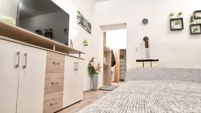 Ein Bett oder Betten in einem Zimmer der Unterkunft SpongeBob Apartment