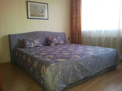 Ein Bett oder Betten in einem Zimmer der Unterkunft Apartment City-Center II