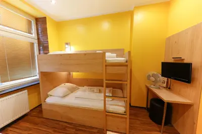 Ein Bett oder Betten in einem Zimmer der Unterkunft Do Step Inn Home - Hotel & Hostel