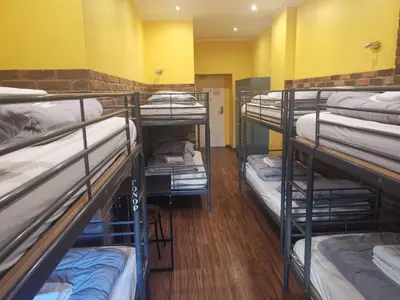 Ein Bett oder Betten in einem Zimmer der Unterkunft Do Step Inn Home - Hotel & Hostel