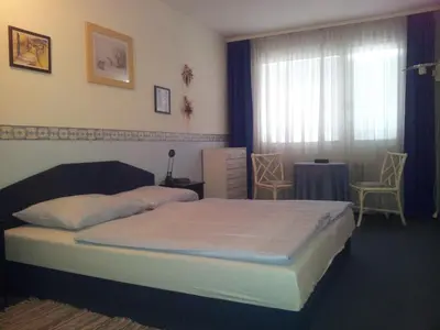Ein Bett oder Betten in einem Zimmer der Unterkunft Cosy Apartment in the City
