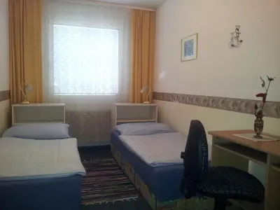 Ein Bett oder Betten in einem Zimmer der Unterkunft Cosy Apartment in the City