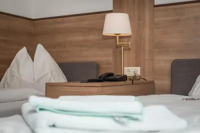 Ein Bett oder Betten in einem Zimmer der Unterkunft Pension Neuer Markt